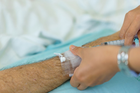 Arm of a man patient in the hospital.の写真素材