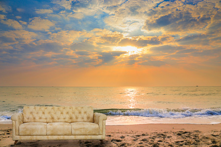 Armchair-Fabric arm chair on Sunset on tropical beach.の写真素材