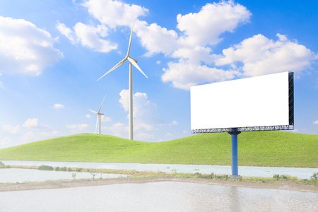 Blank billboard and turbine at the fieldの写真素材