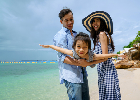 Happy family having fun on summer vacationの写真素材
