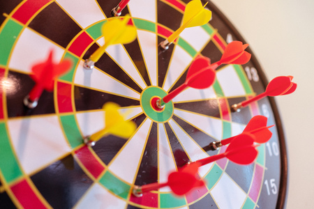 Dart stuck in a dartboardの写真素材