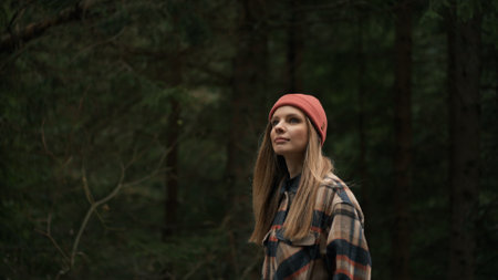 Young woman outdoors enjoying freedom and green natureの写真素材