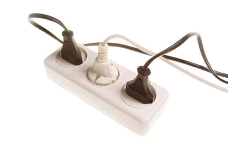 Three electrical plugs into the outlet