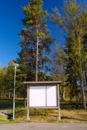 Information board at the path in the parkの写真素材
