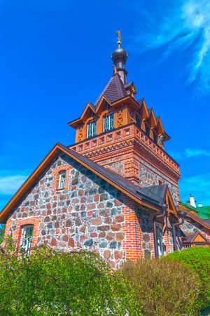 Brick rural Orthodox church in the spring sunny dayの写真素材