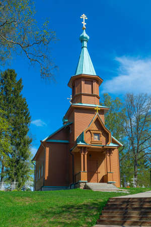 Wooden rural Orthodox church in the spring sunny dayの写真素材