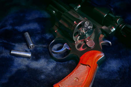 Pistol with shells and scopeの写真素材