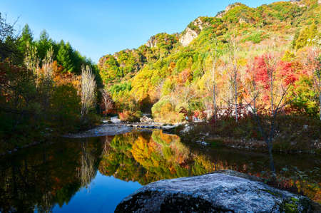 The colorful mountains and lake waterの写真素材