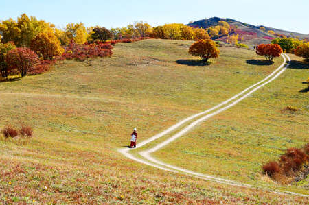 The tourists on the autumn steppe.のeditorial素材