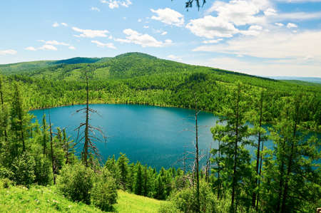The Camel ride sky pond in the Alshan national forest park of China.の写真素材