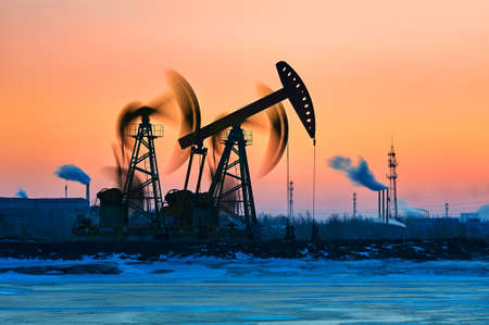 The oil fields sunrise landscape.