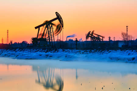 The oil fields sunrise landscape.の写真素材