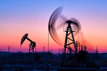 The oil fields sunrise landscape.の写真素材