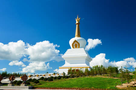 The white pagoda in blue sky and white clouds.の写真素材