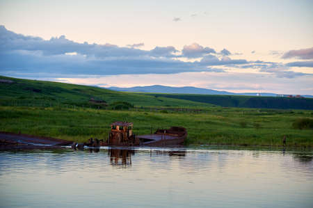 The old boat on the riverside of Russia.の写真素材