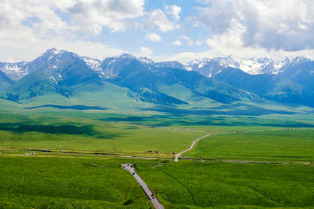 Xinjiang Nala raises the mountain and grassland sceneryの写真素材