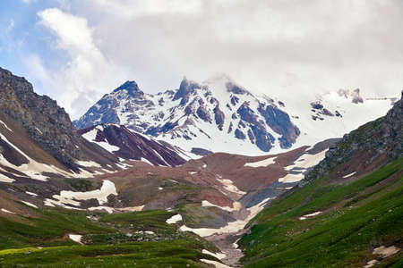 Xinjiang Nala raises the mountain and grassland sceneryの写真素材