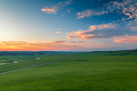 Beautiful sunset in the grasslands of Mongolia. View from above.の写真素材