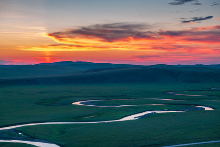 Beautiful sunset in the grasslands of Mongolia. View from above.の写真素材