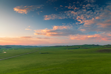 Beautiful sunset in the grasslands of Mongolia. View from above.の写真素材