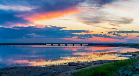 Sunset over Lianhuan Lake, Duerbote Mongolian Autonomous County, Daqing City, Heilongjiang Province, Chinaの写真素材