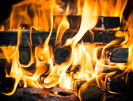 close-up view of stack of wood in BBQ fire