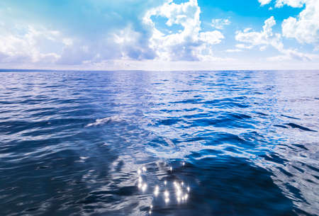 View of horizon line with summer sky\clouds and blue oceanの写真素材