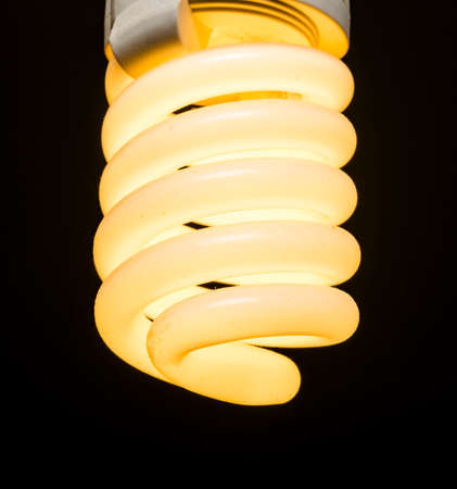 close up of bright energy saving fluorescent light bulb