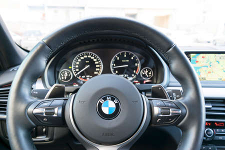 Sankt-Petersburg, Russia, March 05, 2017  BMW X5M 2017, close up of steering wheel  with navigation...
