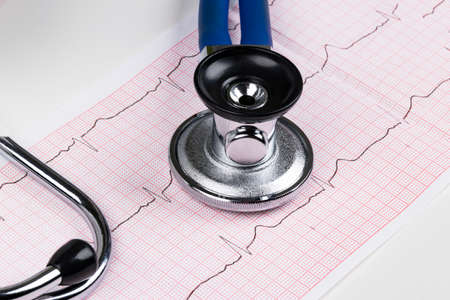 Stethoscope on the electrocardiogram (ECG) graph.Medicine concept. healthcare backgroundの写真素材