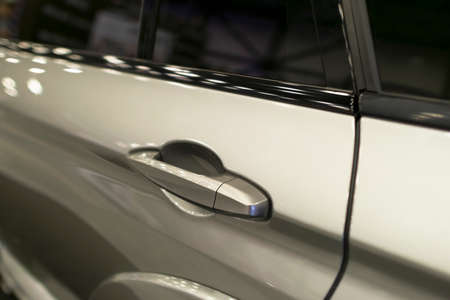 Car door handle of a modern car with car exterior detailsの写真素材