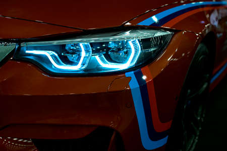 Headlight of a modern sport car.The front lights of the car. Modern Car exterior detailsの写真素材