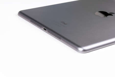 Sankt-Petersburg, Russia, July 05, 2017: Gray Apple Tablet iPad on white background. Apple iPad was created and developed by the Apple inc. Photo taken in Sankt-Petersburg, Russia, July 05, 2017のeditorial素材