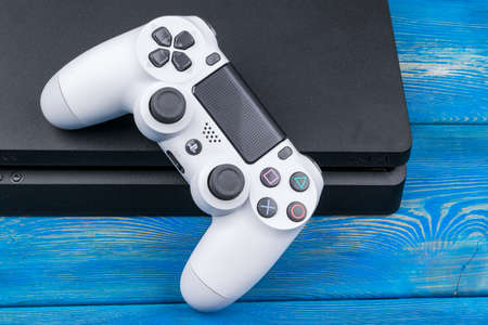 Sankt-Petersburg, Russia, September 24, 2017: Sony PlayStation 4 Slim 1Tb revision and dualshock...
