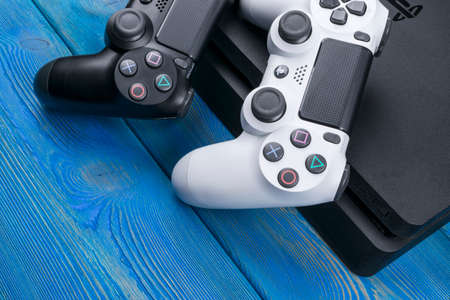 Sankt-Petersburg, Russia, September 24, 2017: Sony PlayStation 4 Slim 1Tb revision and 2 dualshock...