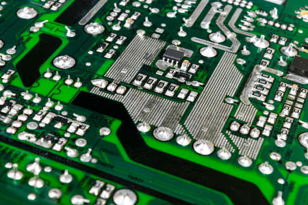 Circuitboard with resistors, microchips and electronic components. Electronic computer hardware...
