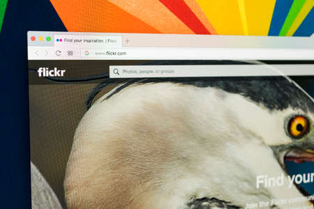 Sankt-Petersburg Russia ,January 11, 2018: Apple iMac with Flickr homepage on monitor screen. Flickr is the video hosting network website. Homepage of Flickr.com on PC computer.のeditorial素材