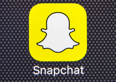 Sankt-Petersburg, Russia, January 25, 2018: Snapchat application icon on Apple iPhone 8 smartphone...