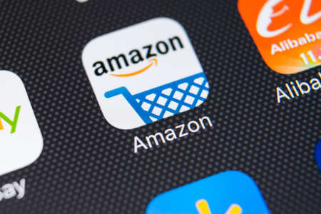 Sankt-Petersburg, Russia, February 11, 2018: Amazon shopping application icon on Apple iPhone X screen close-up.Amazon shopping app icon. Amazon mobile application. Social media networkのeditorial素材