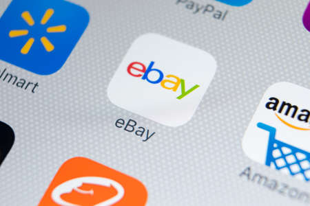 Sankt-Petersburg, Russia, February 9, 2018: eBay application icon on Apple iPhone X screen close-up. eBay app icon. eBay.com is largest online auction and shopping websites.のeditorial素材