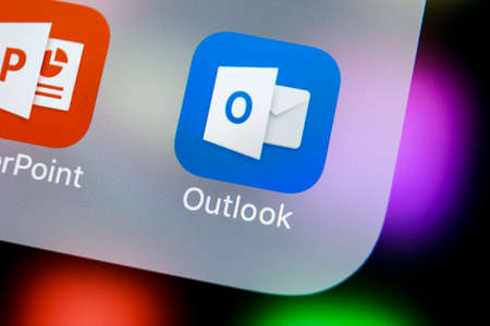 Sankt-Petersburg, Russia, March 21, 2018: Microsoft Outlook office application icon on Apple iPhone X screen close-up. Microsoft outlook app icon. Microsoft OutLook application. Social media networkのeditorial素材