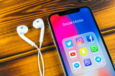 Sankt-Petersburg, Russia, April 5, 2018: Apple iPhone X with icons of social media facebook,...