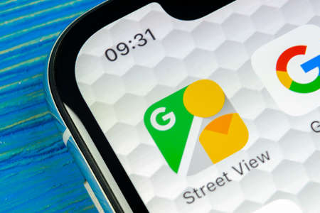 Sankt-Petersburg, Russia, June 20, 2018: Google Street View application icon on Apple iPhone X screen close-up. Google StreetView app icon. Google Street view application. Social media networkのeditorial素材