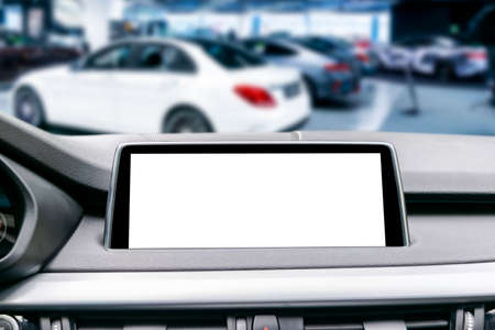 Monitor in car with isolated blank screen use for navigation maps and GPS. Isolated on white with clipping path. Car detailing. Modern car interior detailsの写真素材