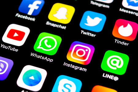 Sankt-Petersburg, Russia, July 29, 2018: Apple iPhone X with icons of social media facebook,...