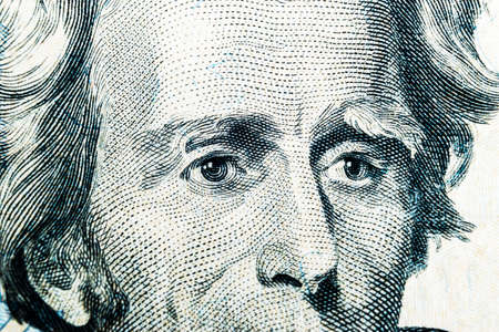 Close up view Portrait of Andrew Jackson on the one twenty dollar bill. Background of the money. 20 dollar bill with Andrew Jackson eyes macro shot. Money background. Face portraitのeditorial素材