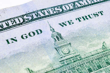 Macro shot image of the corner of a 100 dollar bill banknotes. Concept of financial success. Background of 100 dollar bills. One hundred dollars.の写真素材