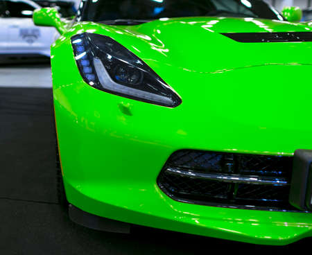 Sankt-Petersburg, Russia, July 21, 2017: Front view of a green Chevrolet Corvette Z06. Car exterior details.のeditorial素材