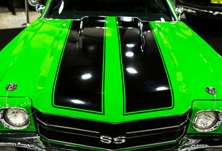 Sankt-Petersburg, Russia, July 21, 2017: Front view of a green great retro american muscle car Chevrolet Camaro SS. Car exterior details.のeditorial素材