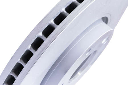 Car Brake disc isolated on white background. Auto parts. Brake disc rotor isolated on white. Braking disk. Car part. Car detailing. Spare partsの写真素材